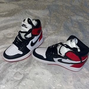 Black and red air jordans